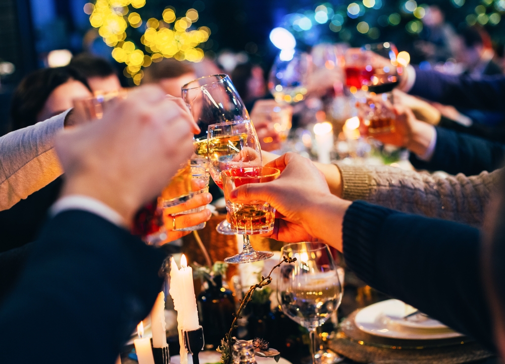 GLASSES BEING raised for festive season celebrations