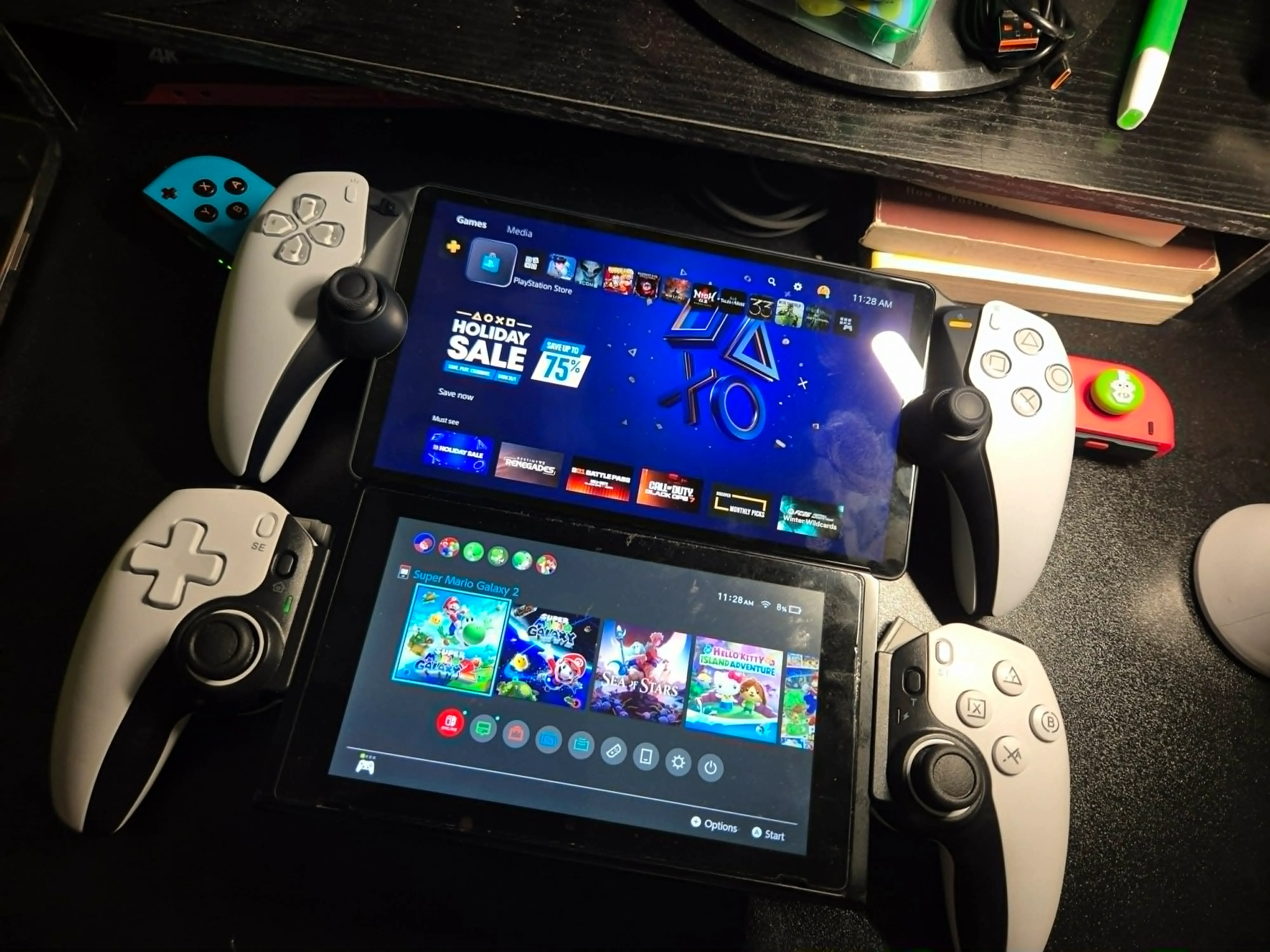 A close up photo of my Playstation portal connected, and at the bottom is my Nintendo Switch 1 with custom controller that looks like PS Portal