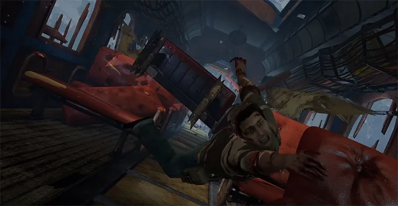 Nathan Drake from Uncharted series is holding on a chair the train is falling 