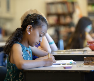 Girl in classroom studying