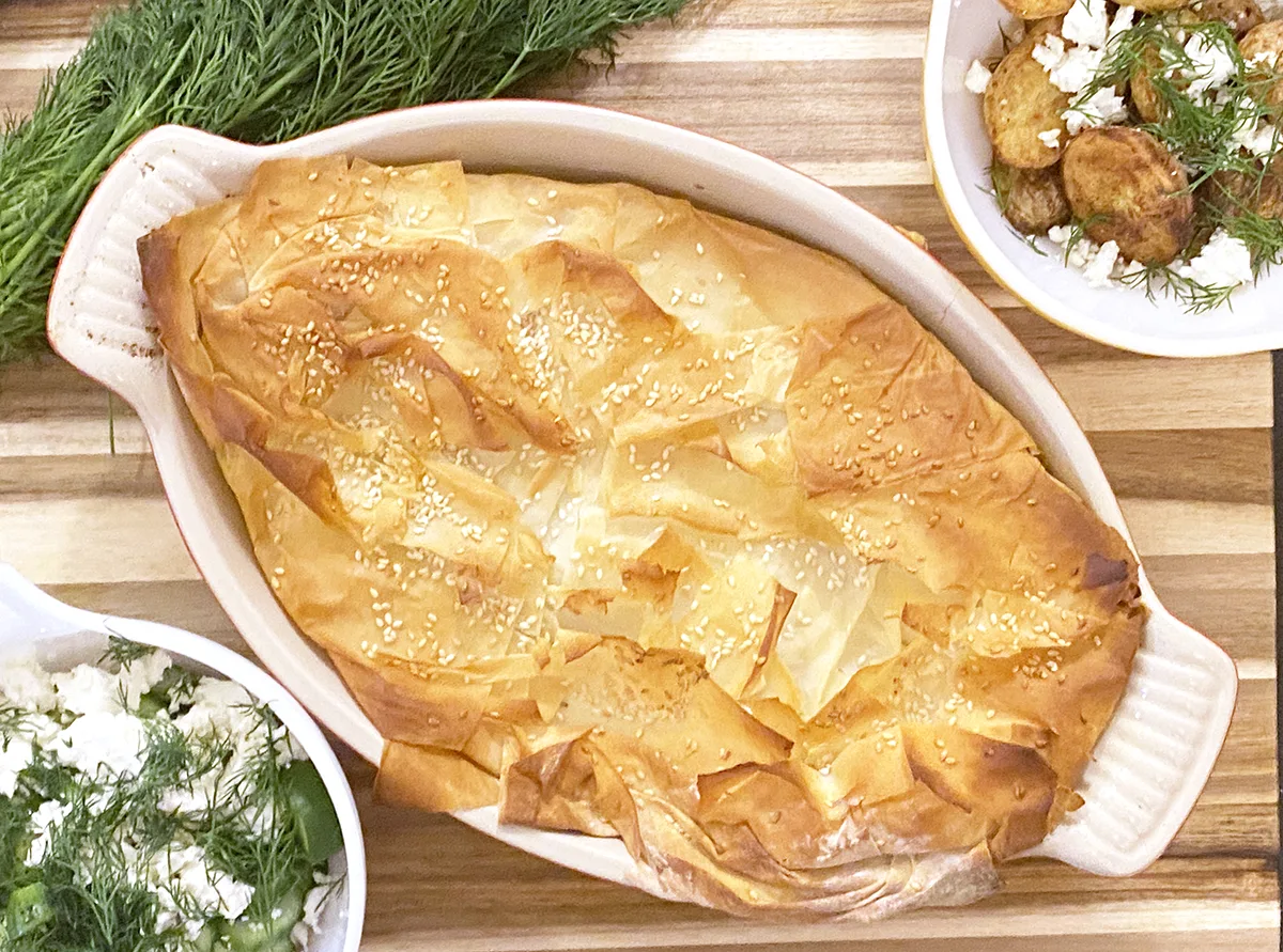 Made of phyllo dough and filled with spinach, ricotta, feta, and onion topped with sesame seed, this spanakopita is a light and crispy dinner