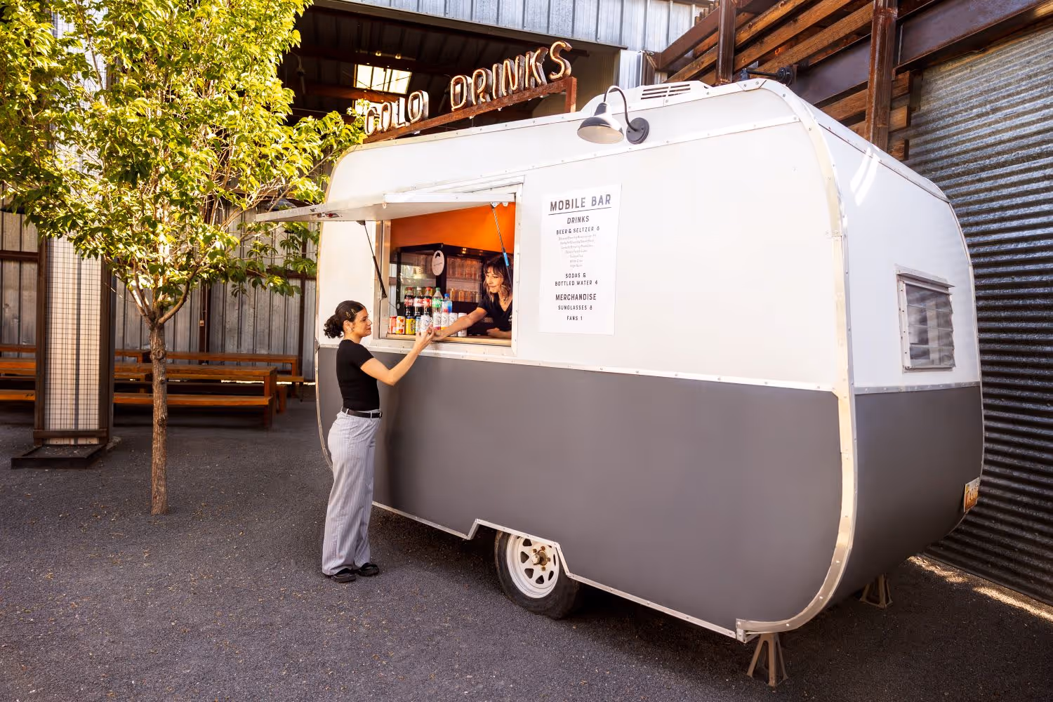 Mobile Bar with woman purchasing a drink