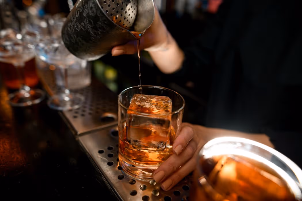 Old Fashioned Style beverage being prepared.