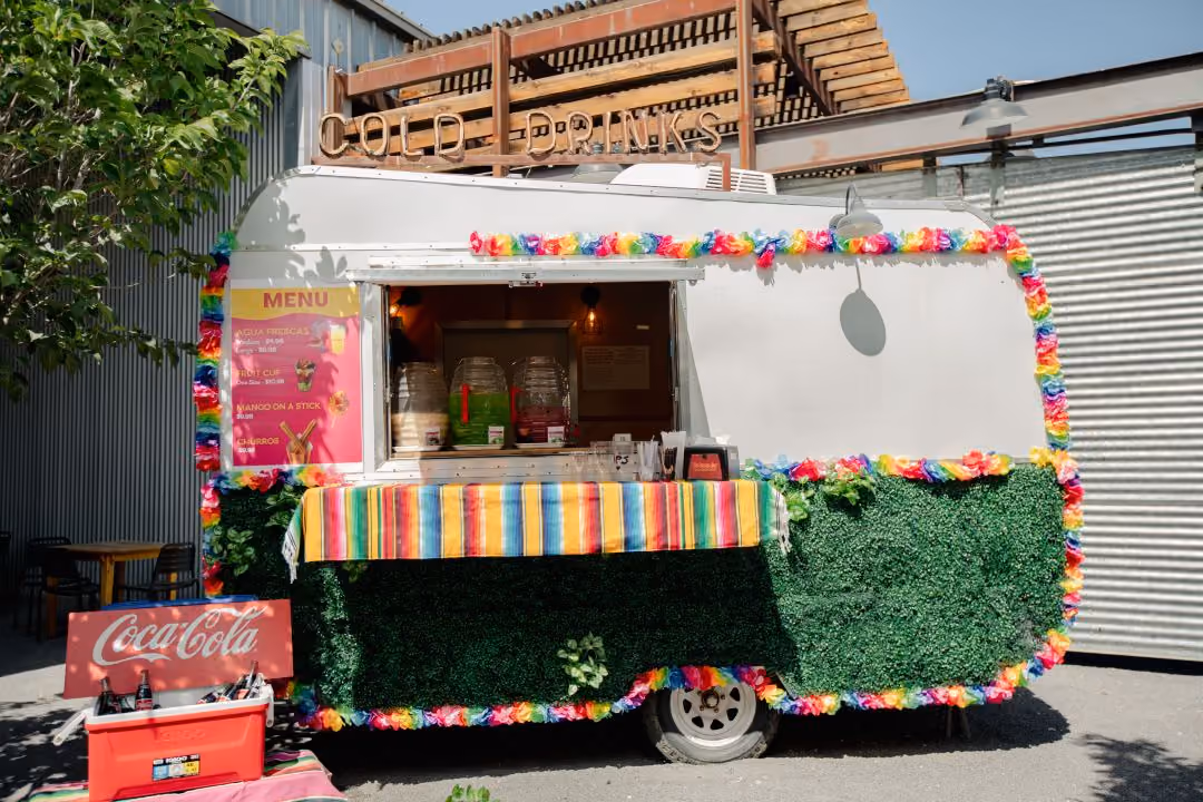 Mobile Bar with floral decor surrounding the display