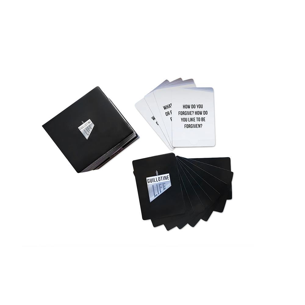 Question cards fanned outside of deck box