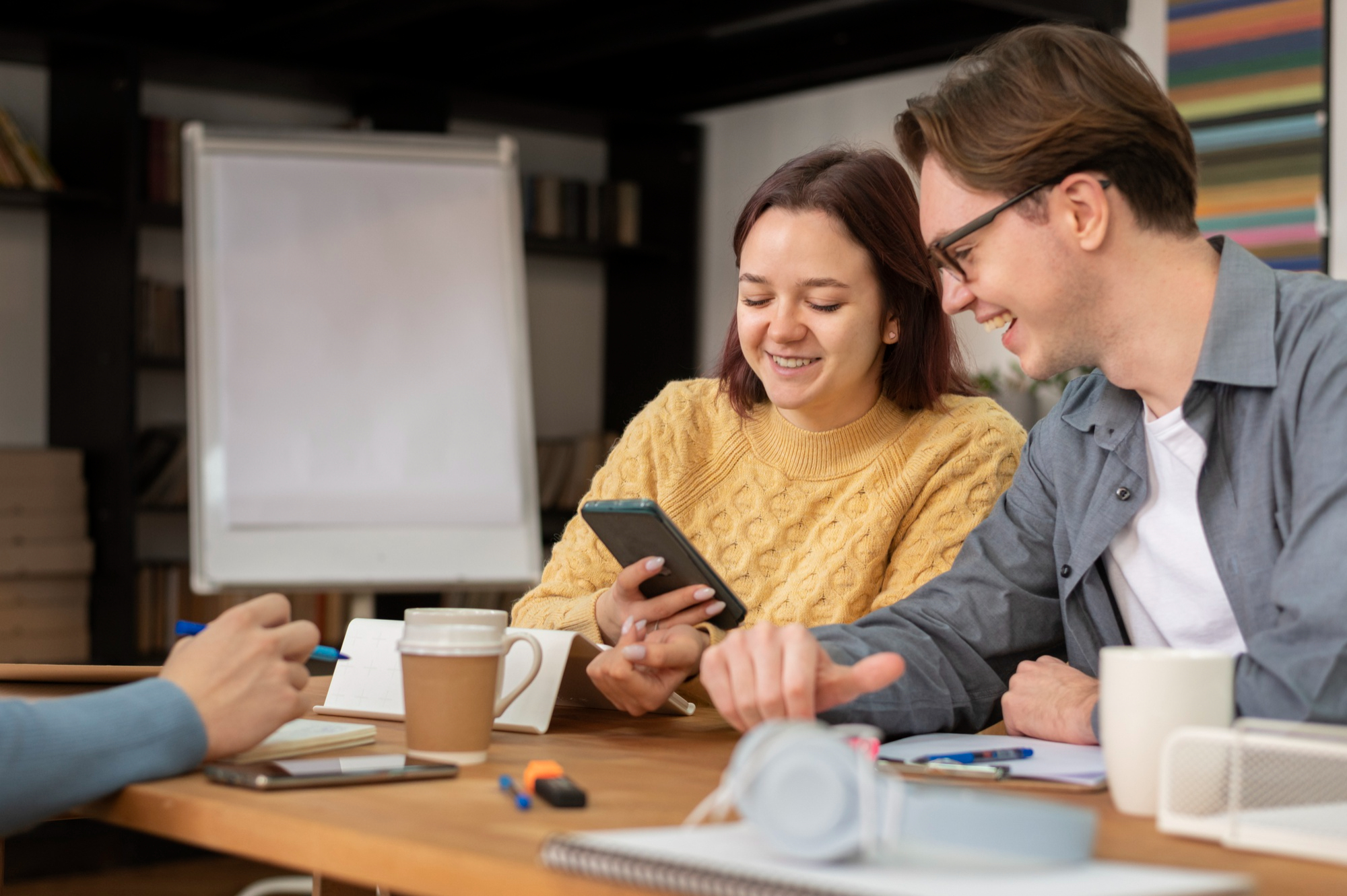 Employee learning about EAP services on mobile phone