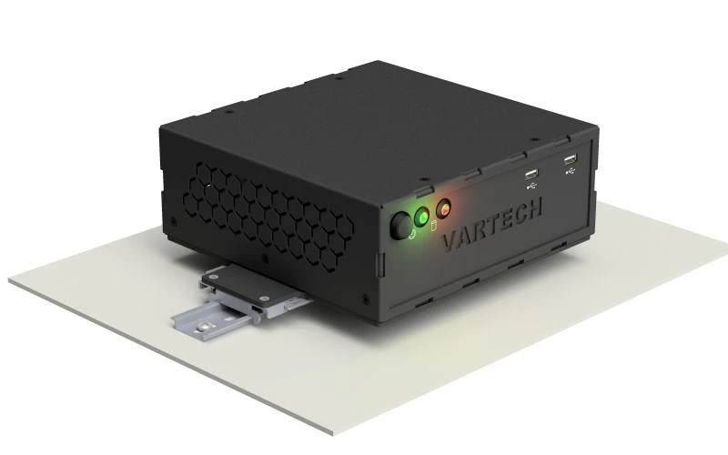 A rendering of VarTech Systems' PowerCube industrial small form factor computer depicted with a DIN rail mounting style