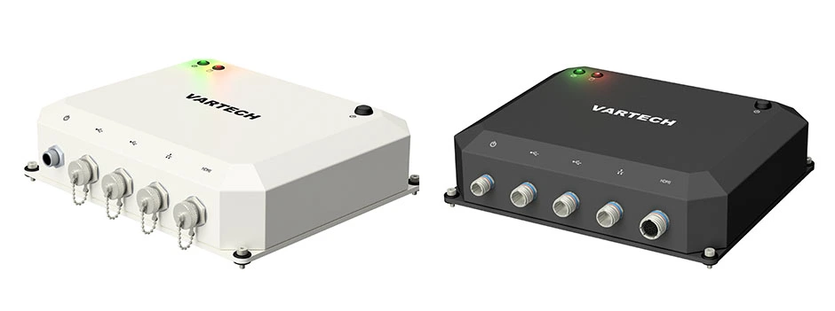 A pair of ToughCube IP67 MIL-STD small form factor computers in black and white powder coated finishes
