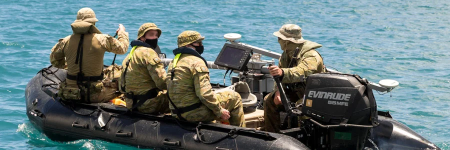 A small naval reconnaissance boat equipped with a rugged All-Weather monitor from VarTech Systems