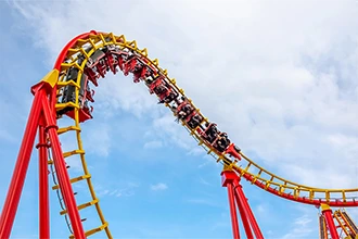 A rollercoaster in a theme park, representing rugged computing solutions for the amusement and attractions industry