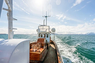 A marine vessel on the ocean, representing VarTech's NEMA and IP-protected marine computers and monitors