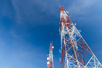 A cell tower, representing the mobile Internet connectivity features in VarTech Systems' rugged computers and HMIs