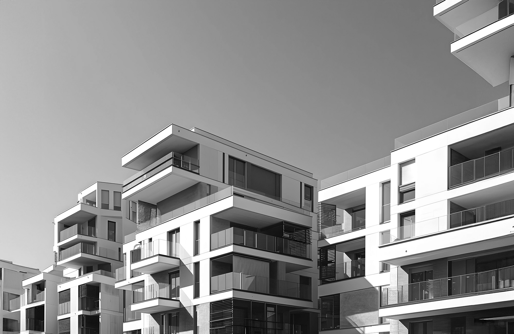 Modern apartments with balconies, showcasing contemporary architecture and urban living