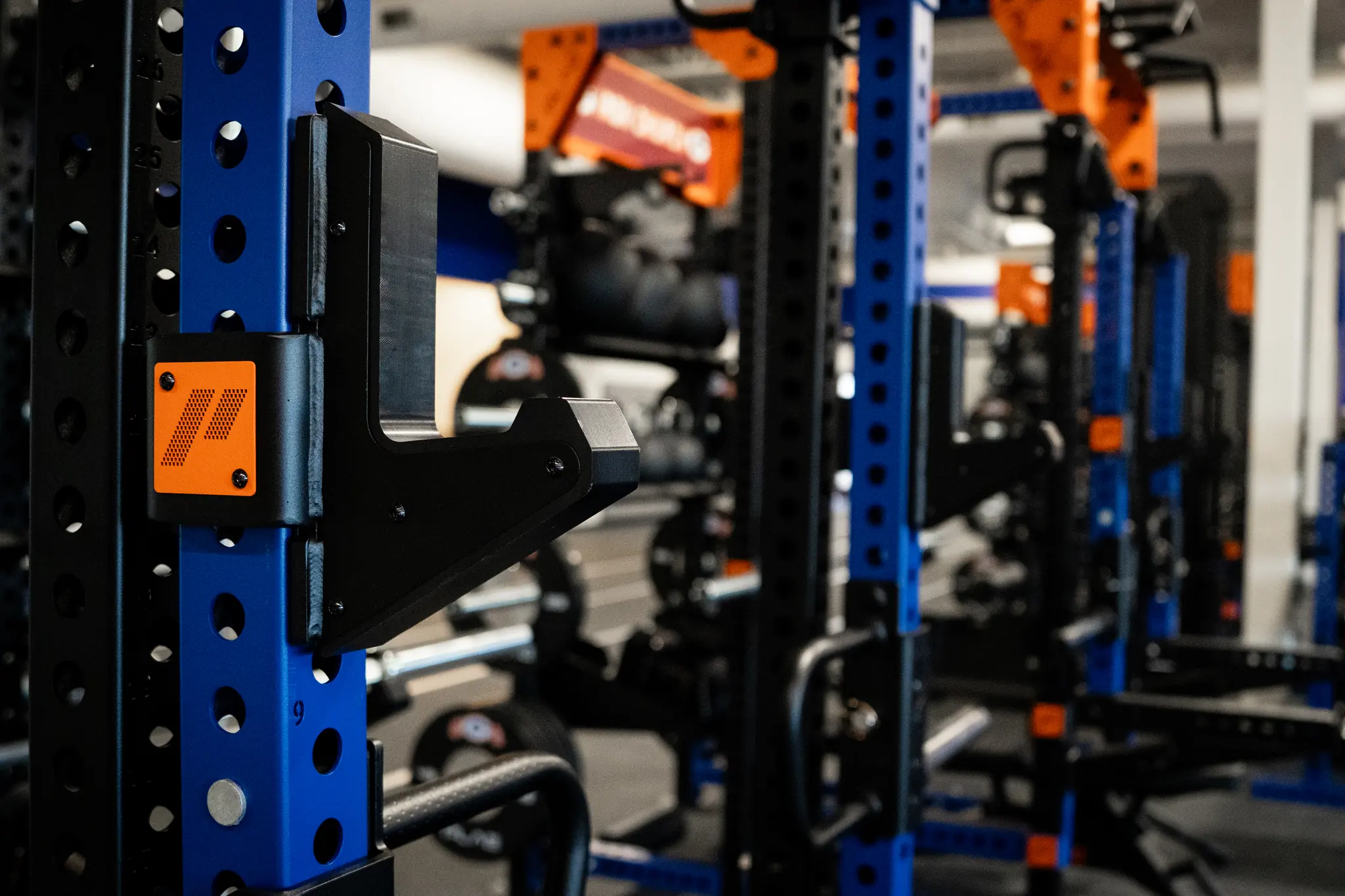 Close-up of a custom PLAE ICONx rack attachment designed for integrated strength training.