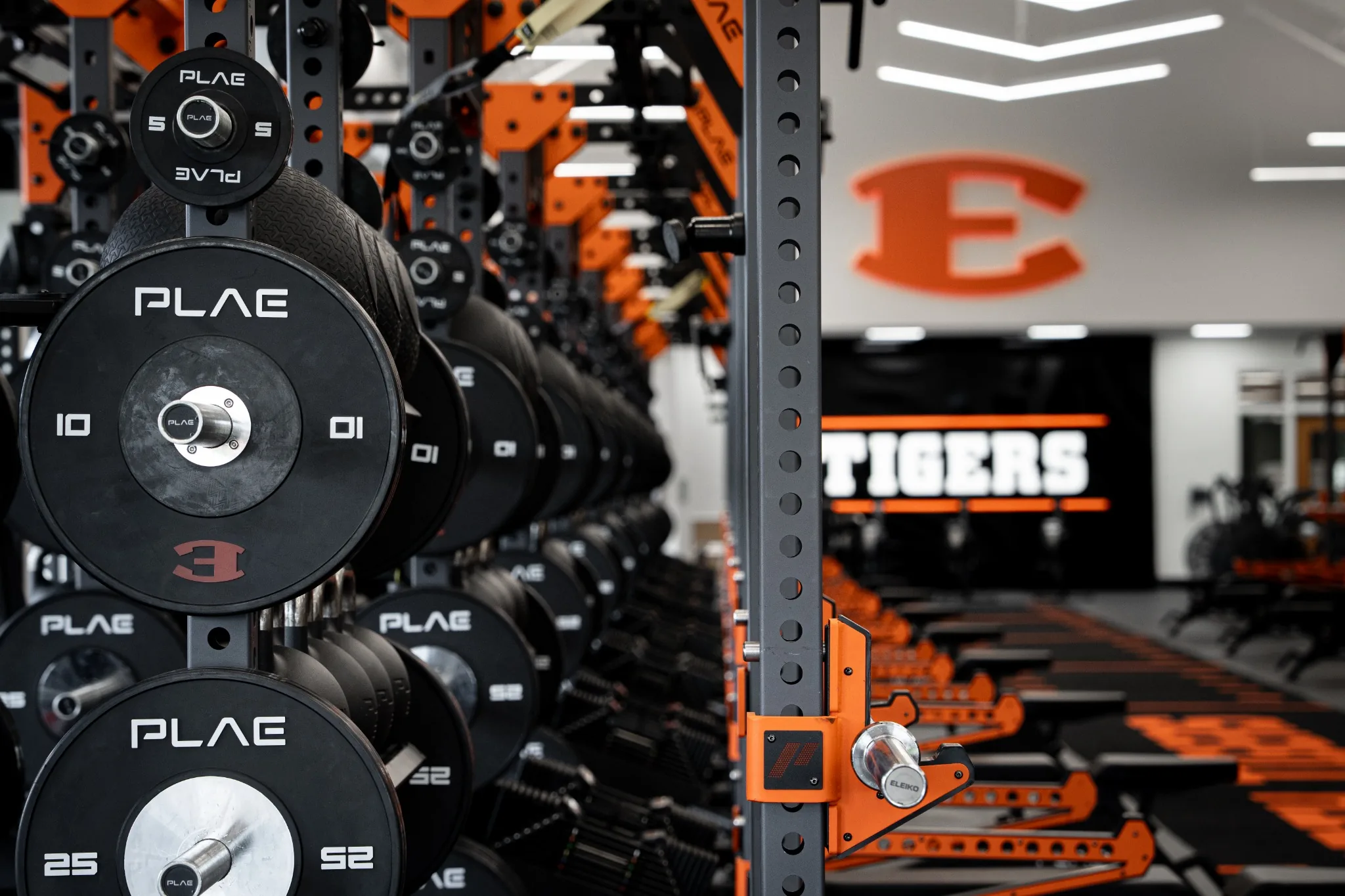 Custom PLAE performance training environment featuring custom branded ICONx racks, Attack turf, Achieve rubber flooring and ARMR strength equipment.