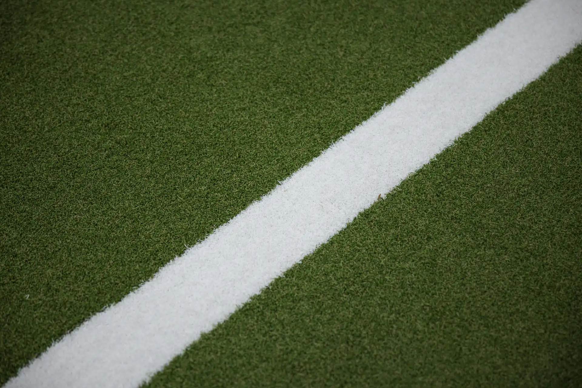 Close-up of a white line marking on ATTACK Performance Turf