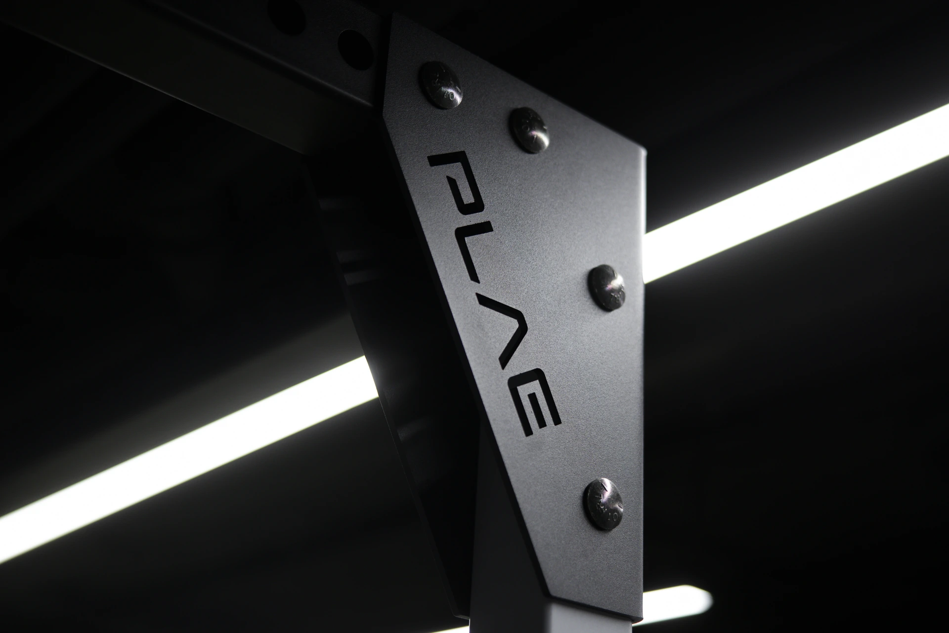 Detail of a PLAE-branded ICONx rack upright with light streaks