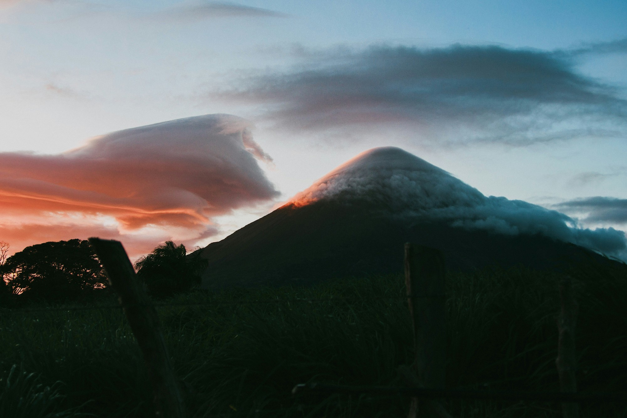 Concepción volcano capped with cloud at sunset, seen from Ometepe
