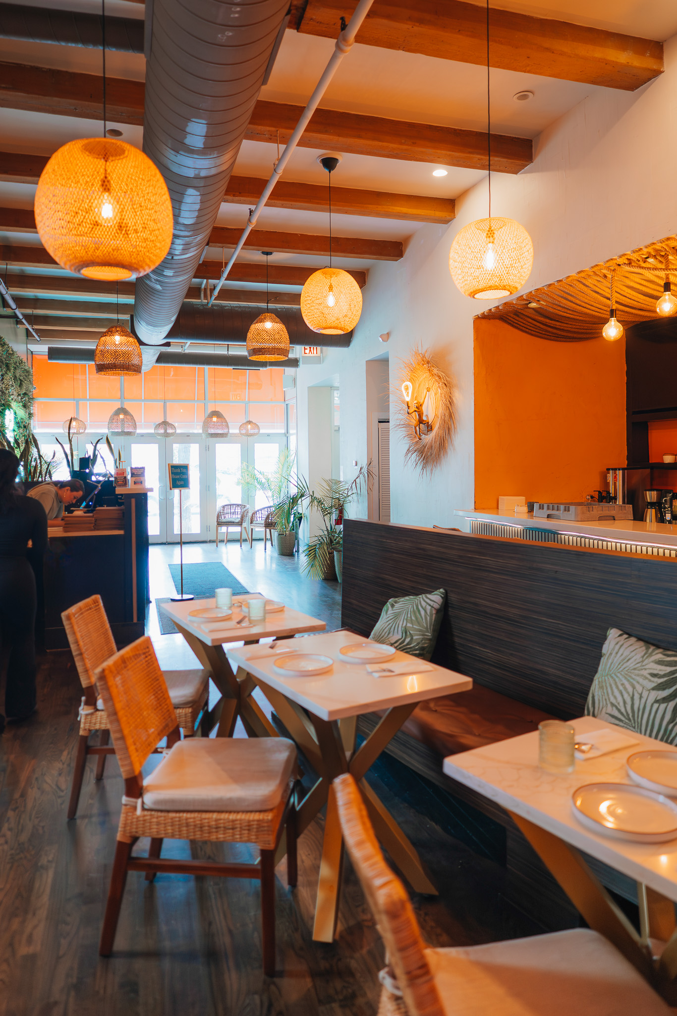 Casa Tulum dining room with woven pendant lights