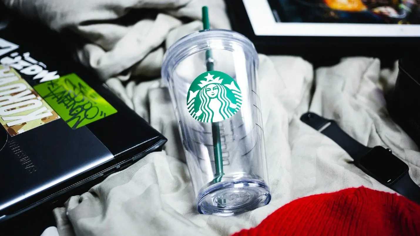 Creative workspace with laptop and design tools used for brand content creation