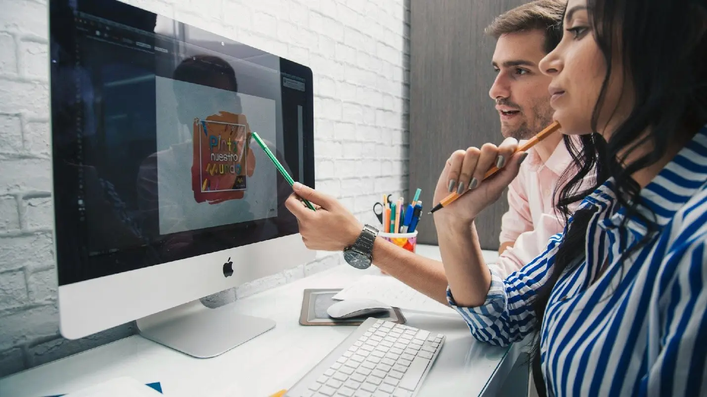 Design team collaborating on digital brand assets and motion design concepts