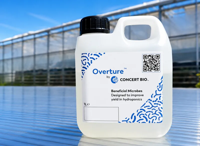 1 litre bottle of Overture® in front of a greenhouse