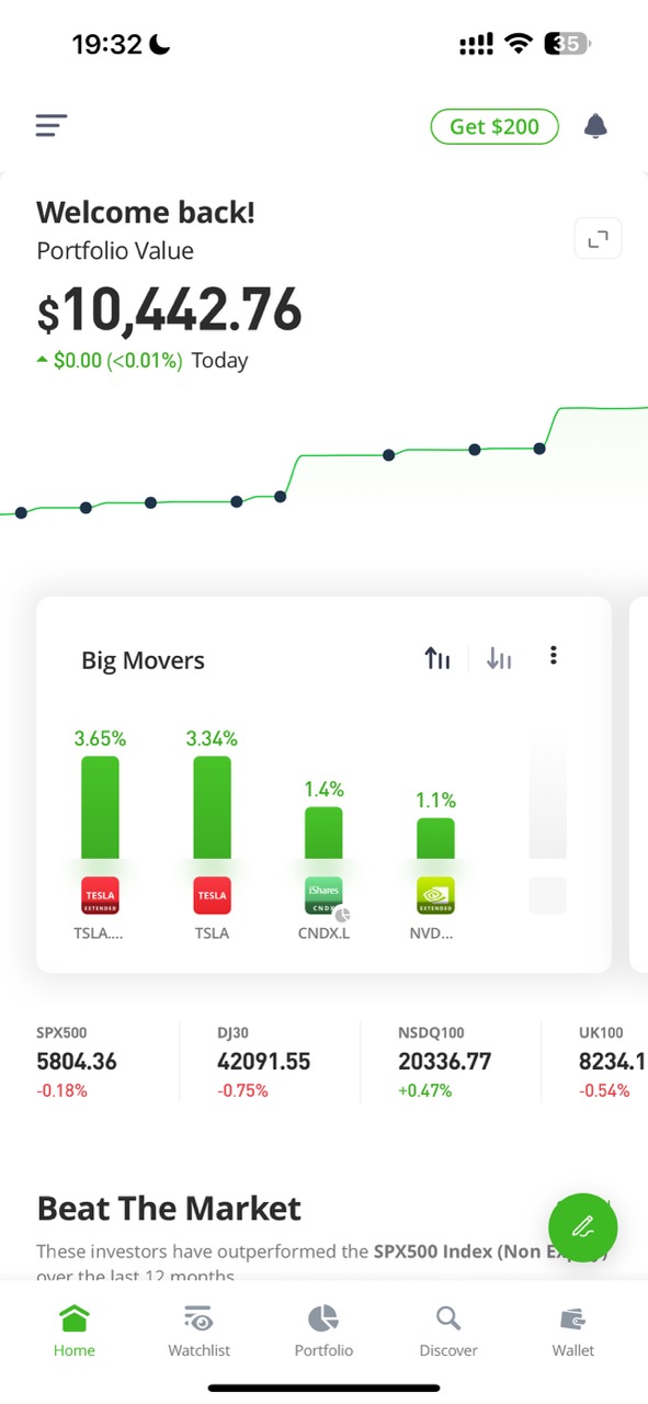 eToro mobile app interface showing trading features, portfolio management and real-time market data on smartphone