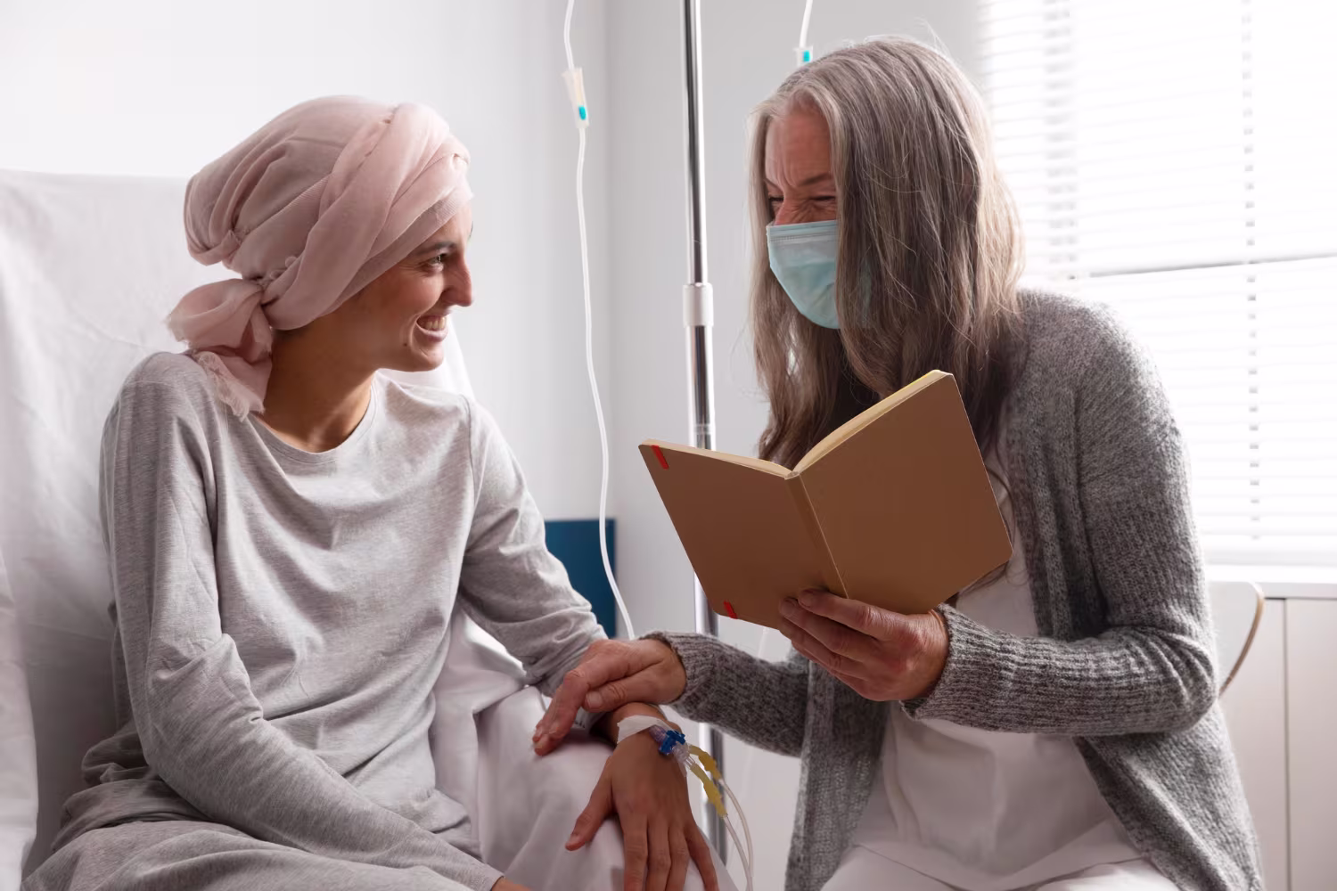 Female patient talking to a female doctor at the hospital
