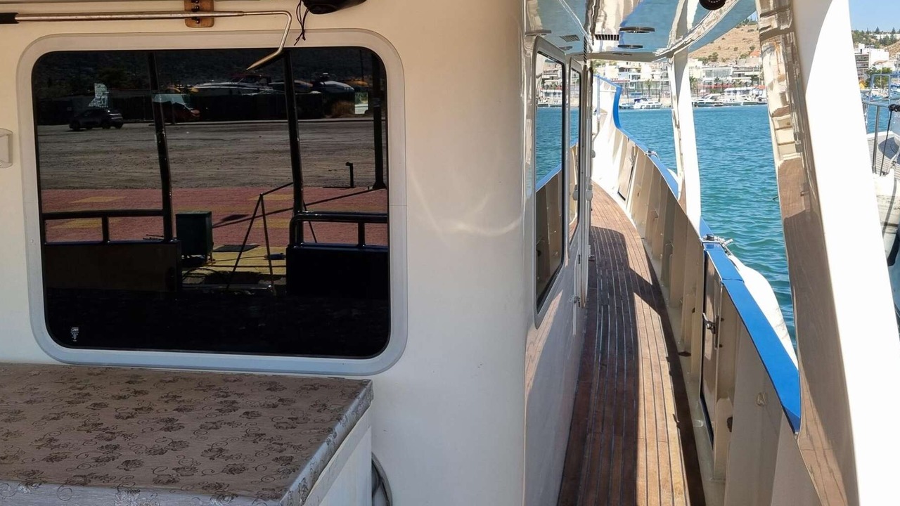 Vripack 69 expedition trawler for sale, 2004, covered starboard side deck
