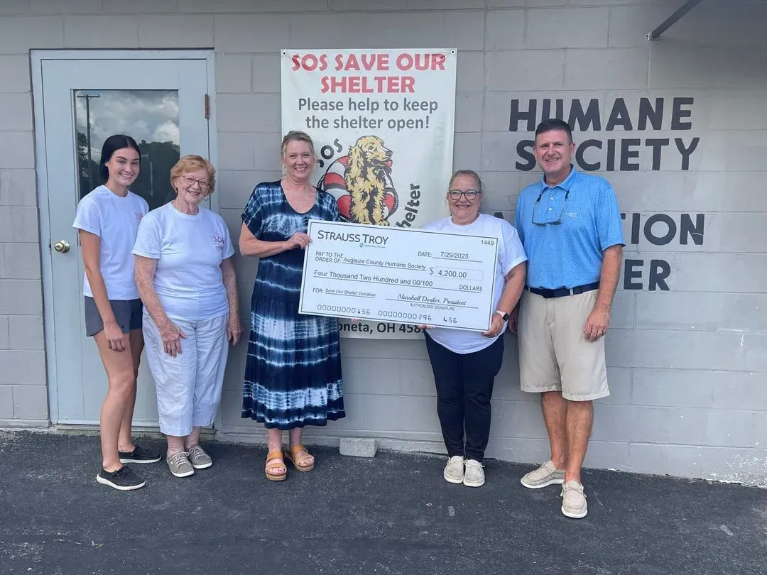 Strauss Troy presents check to Auglaize County Humane Society staff. From left to right: Abby Barrett (ACHS), Sandy Harrison (ACHS), Heather Harrison (Strauss Troy), Deb Logan (ACHS), Pete Smith (Strauss Troy)