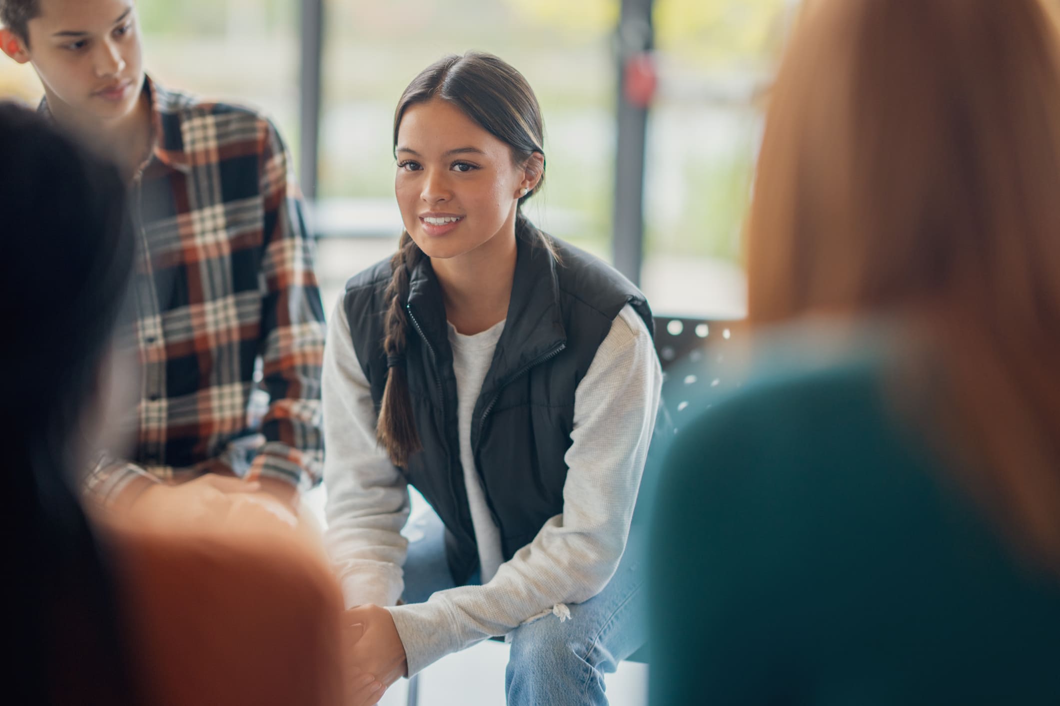 Teen in group therapy
