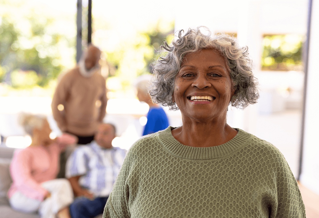 Smiling senior woman enjoying improved confidence and oral health after treatment with the best dental implants in West San Jose.