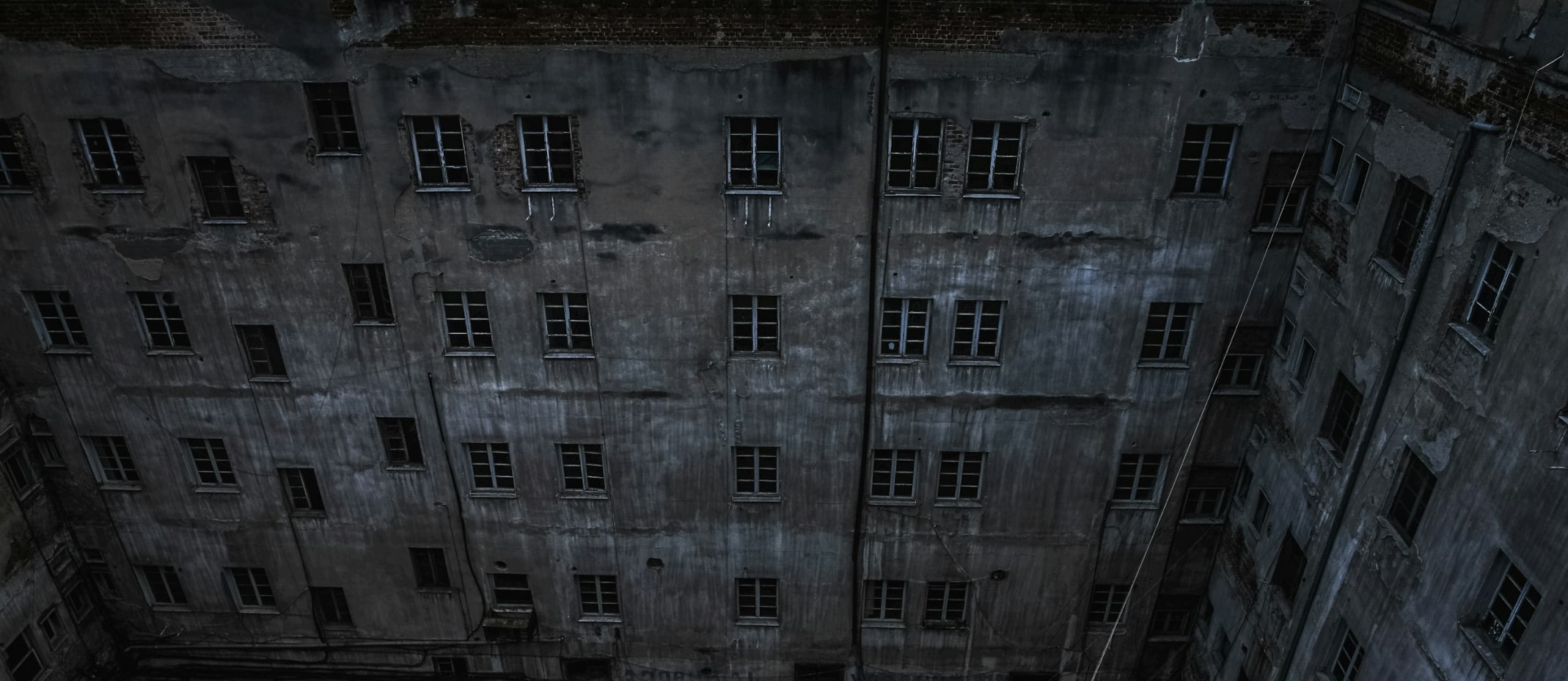 Prison Calls on a Budget - Visual of a prisoner using a phone with a "Budget-Friendly" label, focusing on affordable communication.