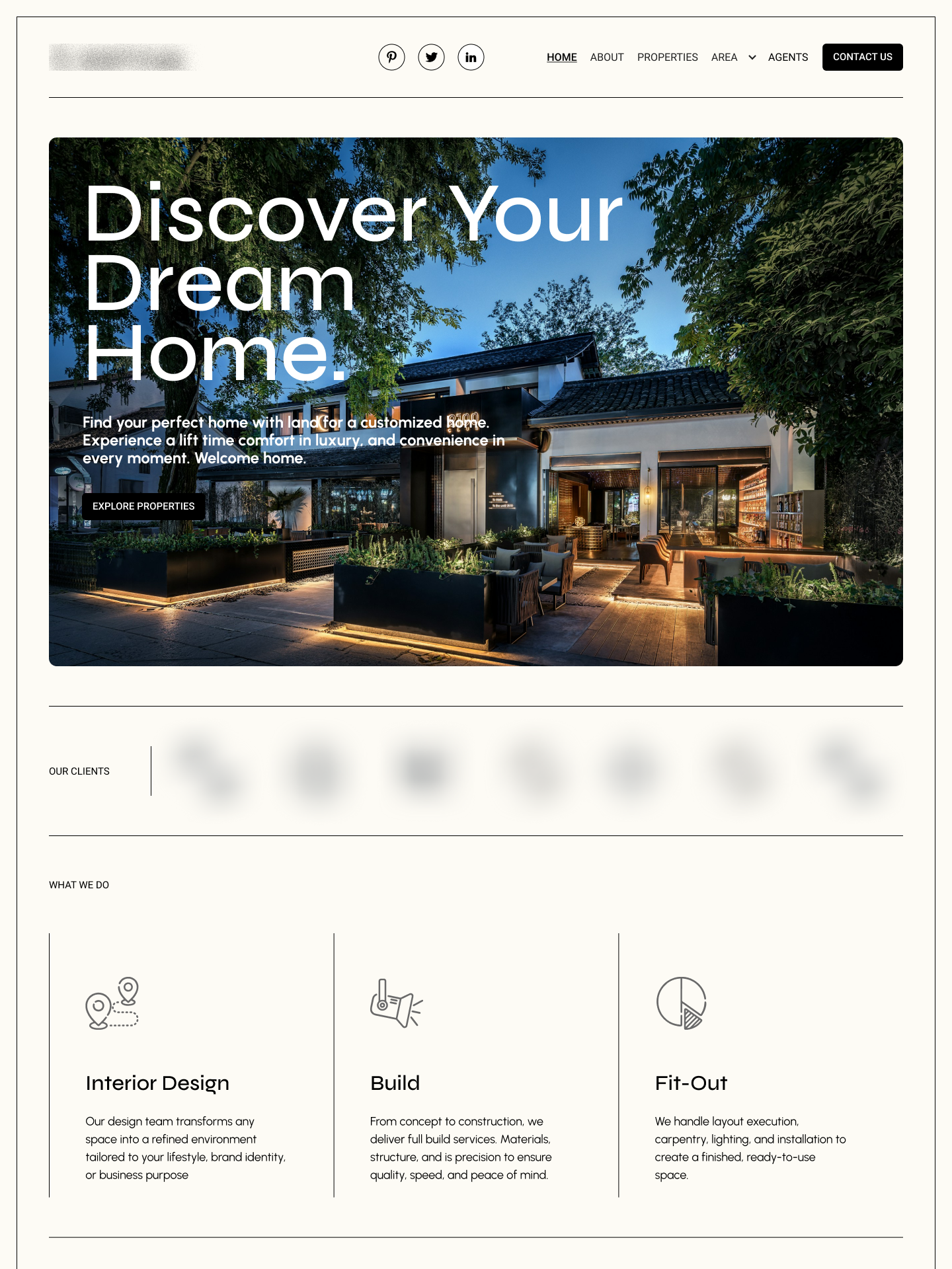 Modern home exterior at dusk with warm interior lighting and outdoor patio seating under trees.