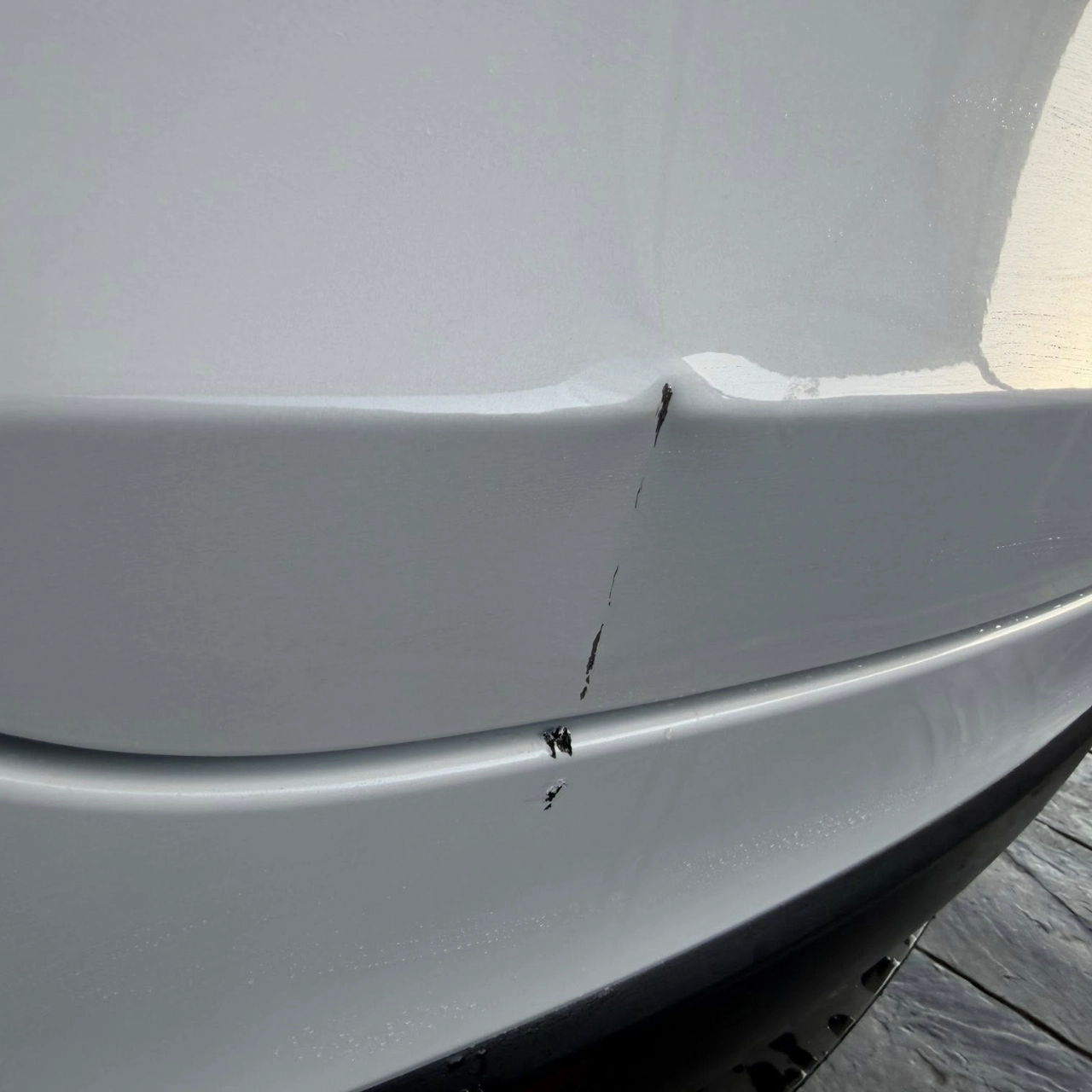 Tesla model y before bumper repair