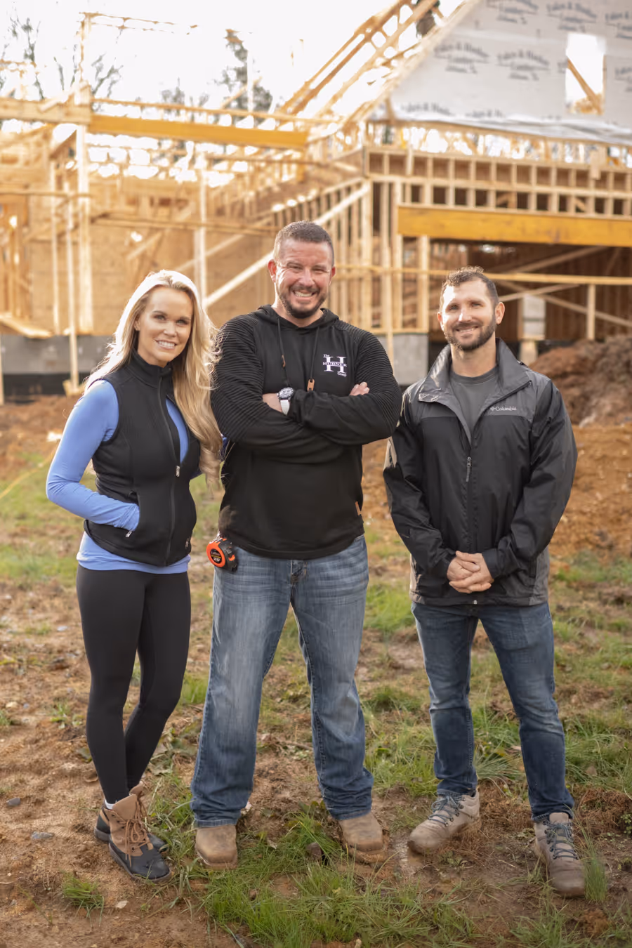 The Hubner Group team visiting a construction site, symbolizing their role in home-building projects.
