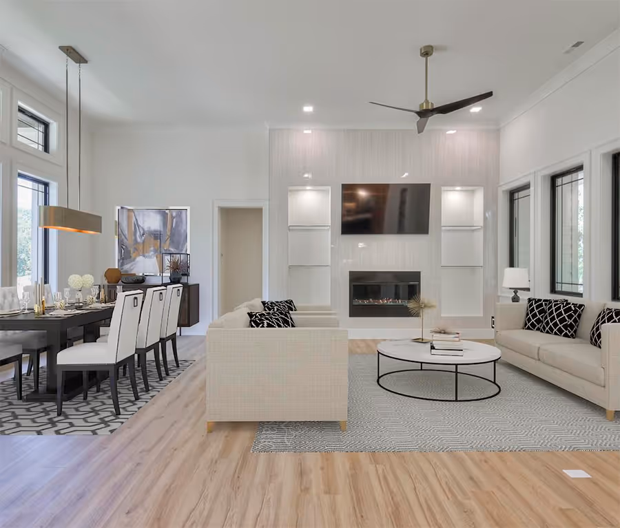 A modern, well-furnished living room with neutral tones and elegant decor.