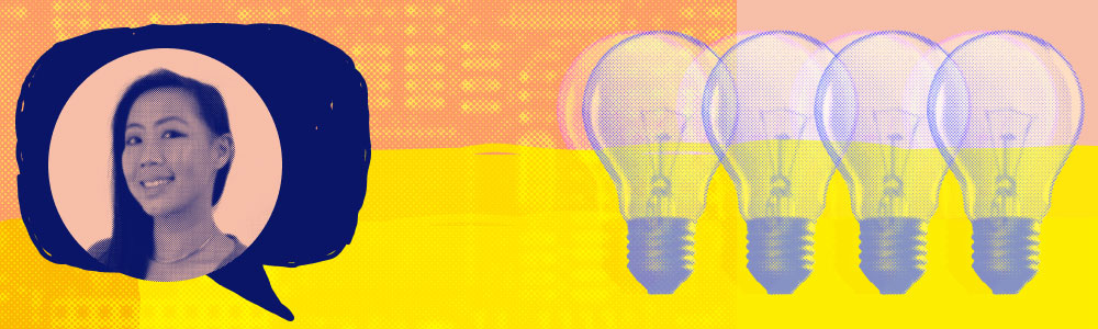 chloe tse smiling next to a banner of lightbulbs