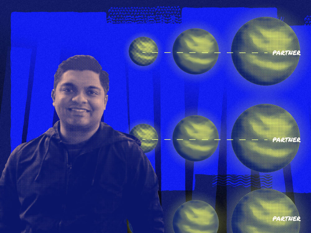 An image of Ajay Bala on a background that shows partner recruitment