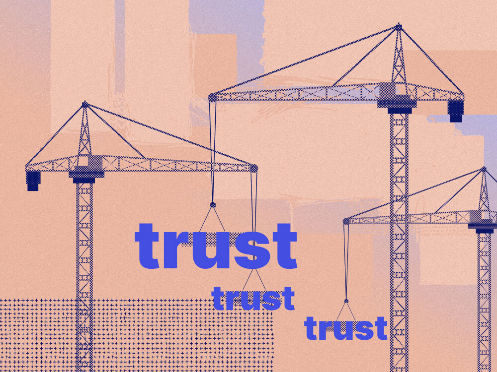 An image showing a construction site with the word "trust" showing that partnerships build trust