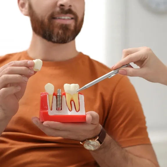 Dental Implants Massapequa Park | Replace Missing Teeth | Cost of Dental  Implants | Smile Creations