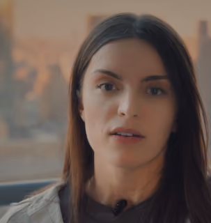 DualEntry team member speaking on camera in an office interview