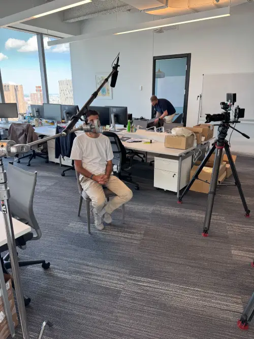 Video shoot in the DualEntry office with camera and boom mic