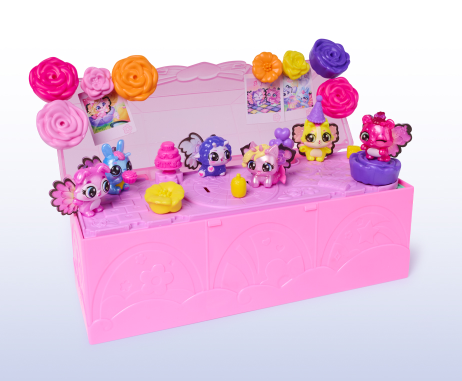 The Bloom Bash toy is pink with Hatchimal figurines and flowers