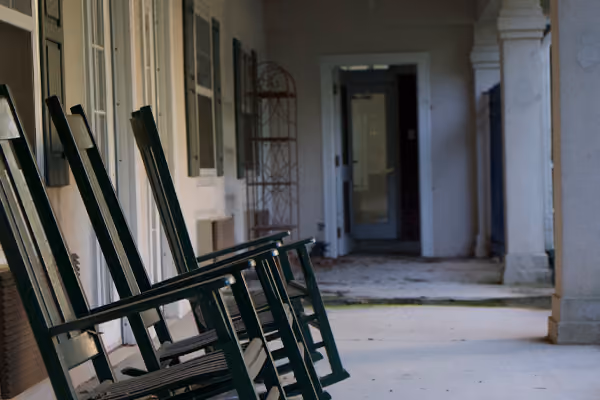 Front porch rocking chairs at St. Ives Hometown Living of Johns Creek