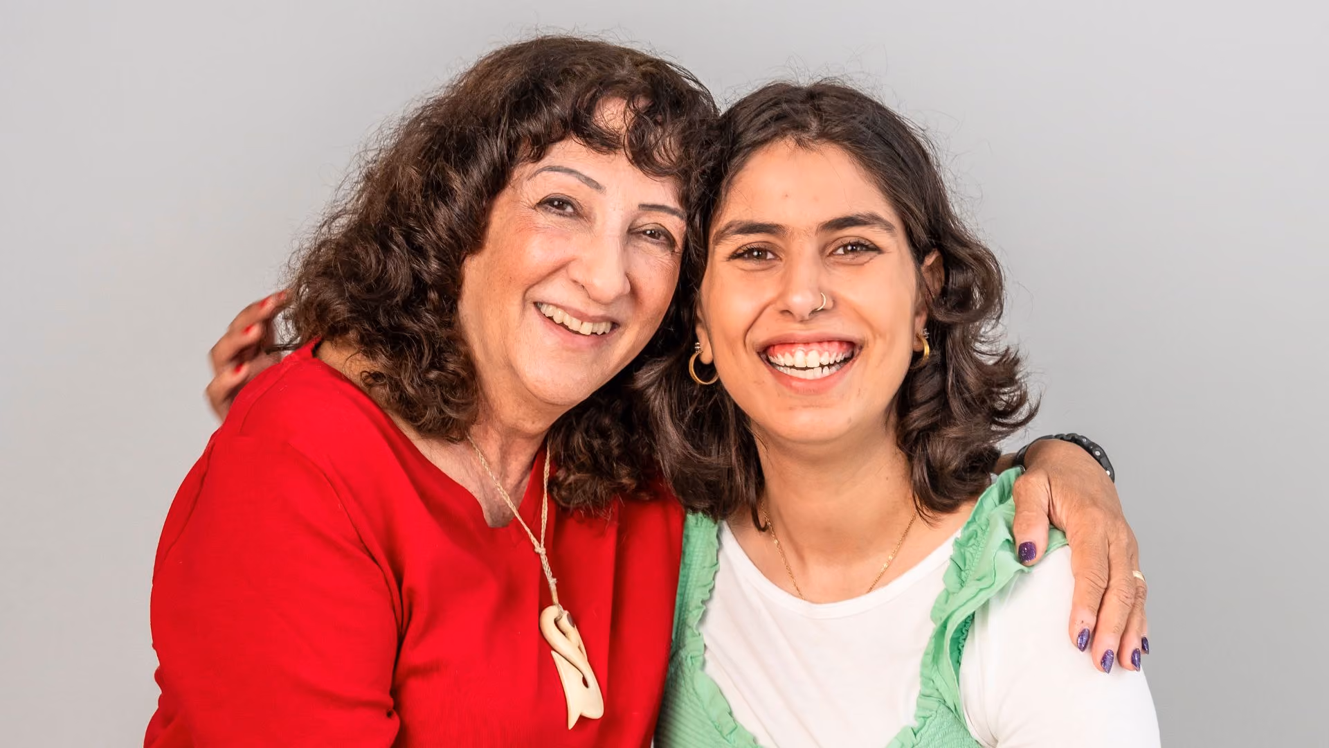 mother hugging adult autistic woman