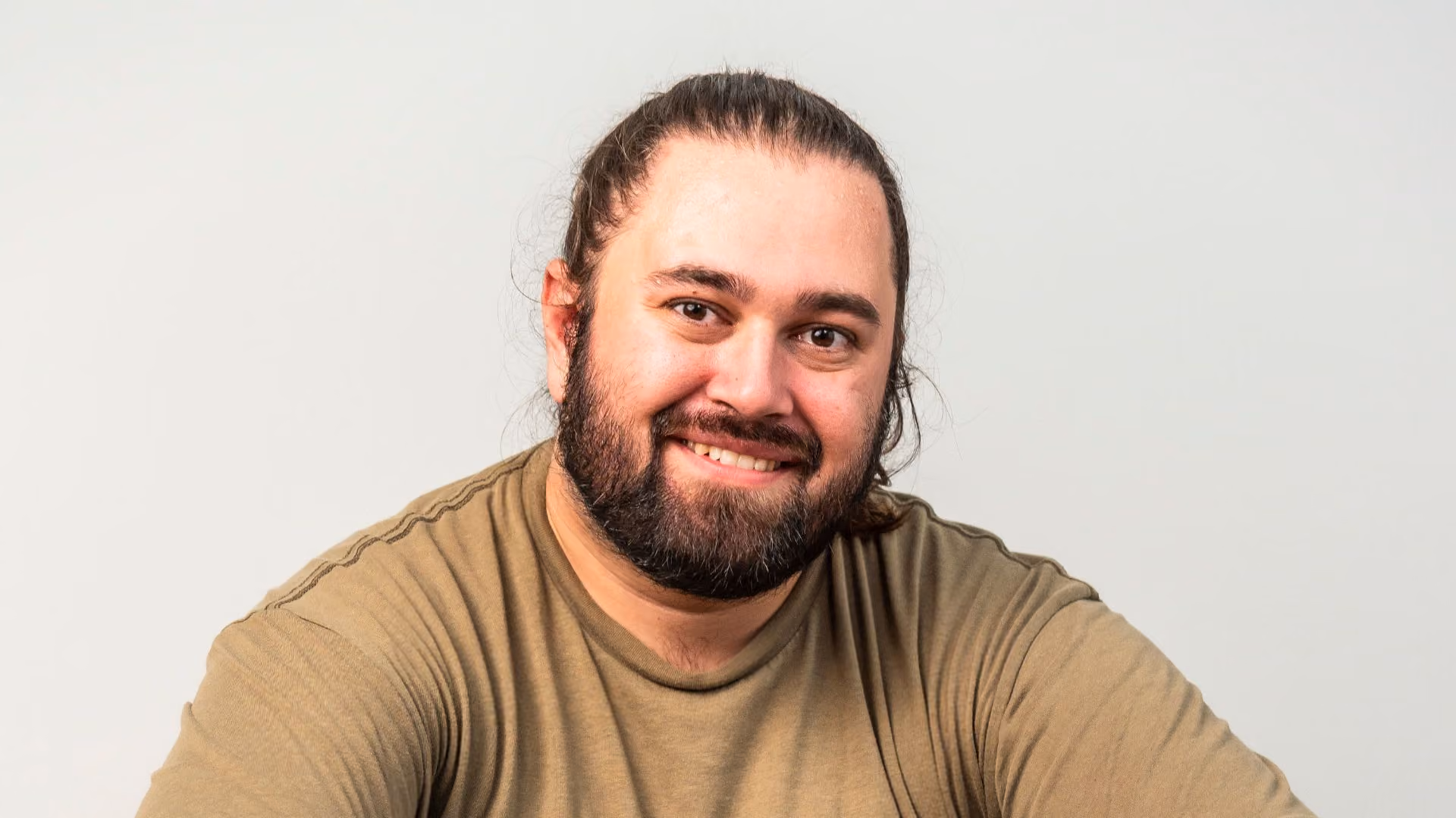 young autistic man smiling