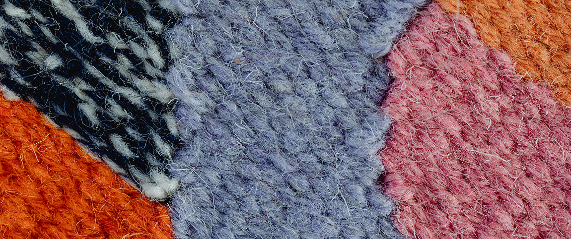 Coloured fabric with patterns close-up