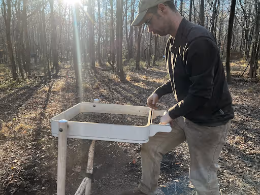 Will McCollum, an anthropology PhD candidate at the University of Chicago, conducting historical and archaeological research at Red Mountain Park