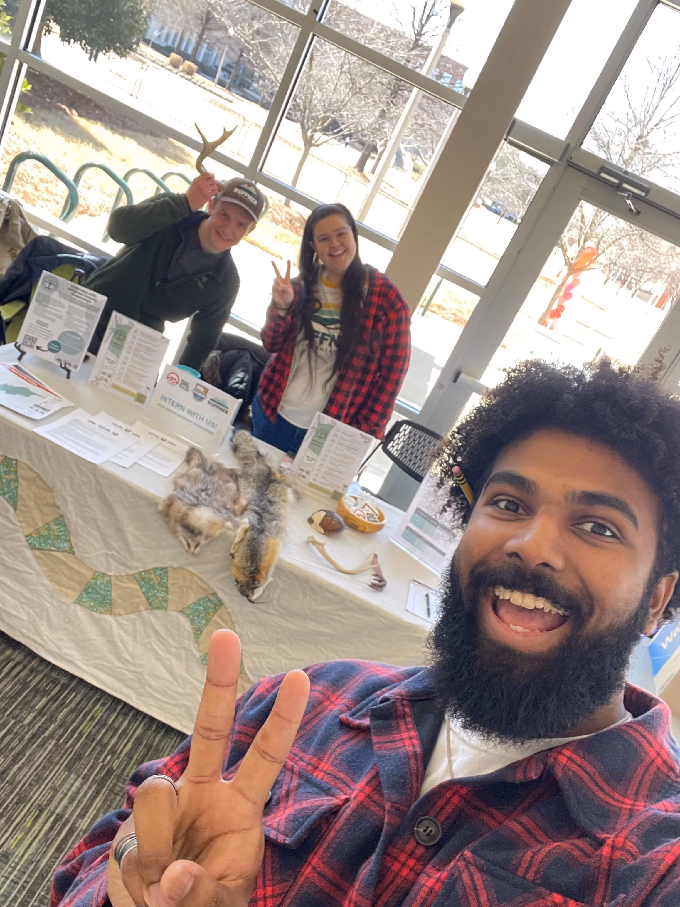 Jefferson County Greenways staff members posing for a photo at a tabling event